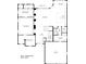 Floor plan of the main level featuring a spacious kitchen, living room, primary bedroom, and wine cellar at 4211 Tangle Dr, Charlotte, NC 28211