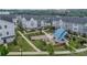 A beautiful aerial view of a neighborhood featuring a central community area with green spaces and seating at 4439 Millennium Ave, Charlotte, NC 28217