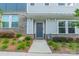 A welcoming front entrance with a well-kept walkway and landscaping, enhancing curb appeal at 4439 Millennium Ave, Charlotte, NC 28217