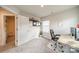 Bright office with desk, comfortable chair, and neutral walls, creating a focused work environment at 4439 Millennium Ave, Charlotte, NC 28217