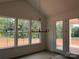 Nook area with large windows offering natural light and views of the landscape at 4622 Serenity Woods Ct, Charlotte, NC 28216