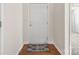 Welcoming entryway with hardwood floors and a stylish rug at 4714 Adamshire Ave, Concord, NC 28025