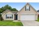 Charming single-Gathering home featuring a two-car garage and a well-manicured lawn at 4714 Adamshire Ave, Concord, NC 28025