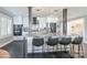 Modern kitchen with stainless steel appliances, granite countertops, and breakfast bar seating at 502 Lake Club Dr, Rock Hill, SC 29732