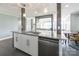 Well-appointed kitchen featuring a granite island with bar seating and modern appliances at 502 Lake Club Dr, Rock Hill, SC 29732