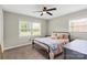 Bedroom featuring a ceiling fan and windows with blinds at 505 Melody Ln, Shelby, NC 28152