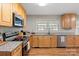Well-equipped kitchen with granite countertops and stainless steel appliances at 505 Melody Ln, Shelby, NC 28152