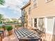Spacious deck with outdoor seating, an outdoor rug, and views of the surrounding backyard and neighborhood at 537 Montgrove Nw Pl, Concord, NC 28027