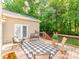 Inviting backyard deck offers a tranquil retreat, enhanced by comfortable seating and picturesque views at 537 Montgrove Nw Pl, Concord, NC 28027