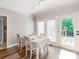Inviting dining area with natural light and sliding door access to the backyard deck at 537 Montgrove Nw Pl, Concord, NC 28027