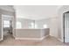 Bright loft area with crown molding and neutral walls offers flexible living space at 537 Montgrove Nw Pl, Concord, NC 28027