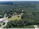 Scenic aerial of a home nestled among trees, offering a secluded and private setting at 5410 A R Gordon Rd, Waxhaw, NC 28173