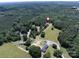 Aerial view showcases a rural property with a house and surrounding greenery at 5410 A R Gordon Rd, Waxhaw, NC 28173