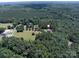 Overhead view of a serene, wooded property, highlighting the home's natural surroundings at 5410 A R Gordon Rd, Waxhaw, NC 28173