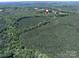 Aerial view of for sale property with a pin showing its location surrounded by green trees at 5410 A R Gordon Rd, Waxhaw, NC 28173