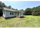 Charming one-story home with gray siding, a brick porch, and surrounded by a green lawn at 5410 A R Gordon Rd, Waxhaw, NC 28173