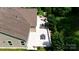 Aerial view of a home showing a spacious patio with multiple seating and dining areas at 5590 Elk Knob Ct, Denver, NC 28037