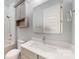 A bright bathroom featuring a shower-tub, toilet, and a sink vanity at 5590 Elk Knob Ct, Denver, NC 28037
