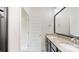 Bathroom featuring double sinks, granite countertops, and modern fixtures at 5590 Elk Knob Ct, Denver, NC 28037