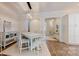 Dining area with modern lighting, neutral colors, and seamless access to other living spaces at 5590 Elk Knob Ct, Denver, NC 28037
