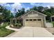 Charming home with a two-car garage, well-manicured landscaping, and welcoming curb appeal at 5590 Elk Knob Ct, Denver, NC 28037