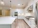 Bright kitchen features stainless steel appliances, a center island, and modern finishes at 5590 Elk Knob Ct, Denver, NC 28037