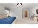 Bright main bedroom featuring an ensuite bathroom, a ceiling fan, and neutral walls at 5590 Elk Knob Ct, Denver, NC 28037