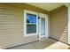Back door and window provide natural light and access to the outdoor space at 6333 Cory Bret Ln, Charlotte, NC 28278