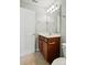 Bathroom with single vanity and wooden cabinet at 6333 Cory Bret Ln, Charlotte, NC 28278