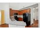 Updated kitchen boasts stainless steel appliances, granite countertops, and a breakfast bar at 6333 Cory Bret Ln, Charlotte, NC 28278