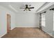 Spacious main bedroom with tray ceiling, ceiling fan, and natural light at 6333 Cory Bret Ln, Charlotte, NC 28278