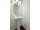 Charming powder room includes a pedestal sink, updated fixtures, and neutral decor at 6333 Cory Bret Ln, Charlotte, NC 28278