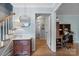 Elegant foyer featuring hardwood floors, staircase, and stylish decor, enhancing the home's appeal at 6745 Wheeler Dr, Charlotte, NC 28211