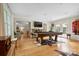 Large game room providing a pool table, a cozy seating area, and access to outdoor entertainment at 6745 Wheeler Dr, Charlotte, NC 28211