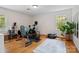 Spacious home gym with exercise equipment and natural light, perfect for staying active at 6745 Wheeler Dr, Charlotte, NC 28211