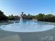 Spacious community pool featuring fountains and ample seating, perfect for relaxation and social gatherings at 707 Five Leaf Ln, Waxhaw, NC 28173
