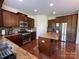 Kitchen island with granite countertops provides lots of workspace at 707 Five Leaf Ln, Waxhaw, NC 28173