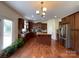 Eat-in kitchen features stainless appliances, granite countertops and wood cabinets at 707 Five Leaf Ln, Waxhaw, NC 28173