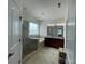 The primary bathroom has a glass shower, a tub, and double sinks at 707 Five Leaf Ln, Waxhaw, NC 28173