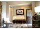 Inviting entryway features a bench with storage and a decorative painting, with stylish flooring and natural light at 7170 Kenyon Dr, Denver, NC 28037