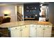 Bright kitchen featuring granite counters, white cabinets, and a functional layout perfect for entertaining at 7170 Kenyon Dr, Denver, NC 28037