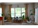 Bright and airy living room with natural light and plants at 7170 Kenyon Dr, Denver, NC 28037