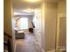 Bright living room with neutral color scheme and stairs at 7170 Kenyon Dr, Denver, NC 28037