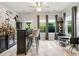 Entertaining bar with liquor storage, decorative lighting, and exterior view at 7809 Creek Park Dr, Denver, NC 28037