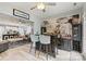 Entertaining bar area with seating open to the kitchen and living area at 7809 Creek Park Dr, Denver, NC 28037