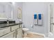 Cozy bathroom features a granite countertop, modern vanity and a shower for added convenience at 7809 Creek Park Dr, Denver, NC 28037