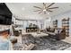 Open concept living room, hardwood flooring, stylish decor, and lots of space at 7809 Creek Park Dr, Denver, NC 28037