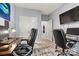 Home office area offering a quiet workspace with neutral colors and ample lighting for productivity at 7809 Creek Park Dr, Denver, NC 28037