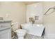 Modern bathroom with stand alone tub and herringbone tile accents at 815 Granby Dr, Fort Mill, SC 29708