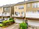 Townhome exterior elevation with private back patios and drive-under garages at 815 Granby Dr, Fort Mill, SC 29708